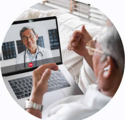 Senior man on computer doing virtual health consultation